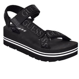 Guess Women’s Avin Wedge Sandal -BLK
