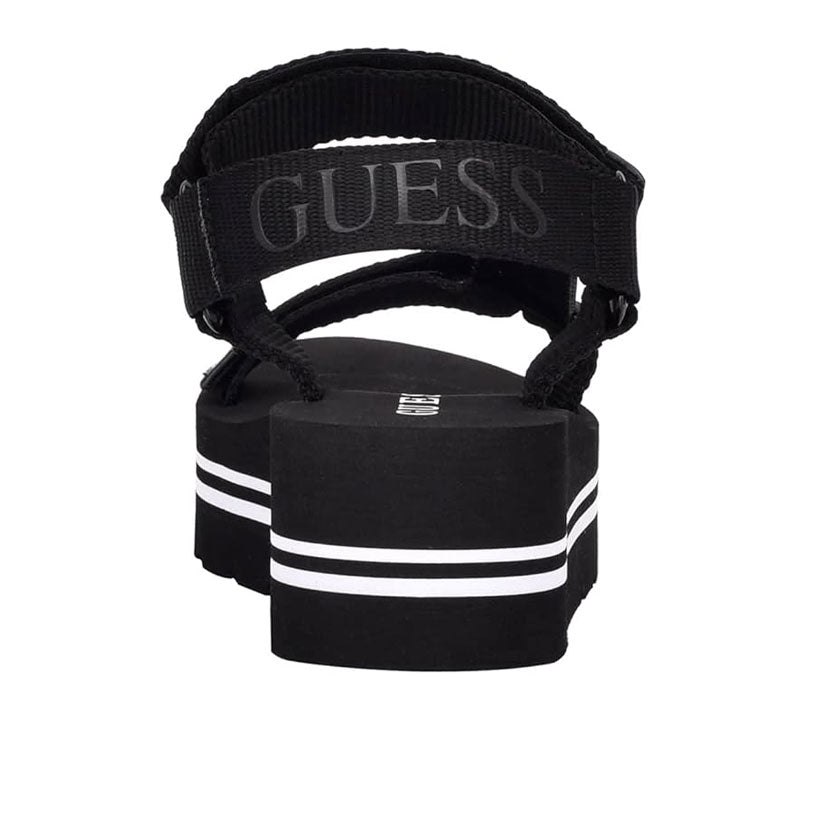 Guess Women’s Avin Wedge Sandal -BLK