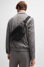 ⁦HUGO Belt bag in faux leather with metallic stacked logo⁩ - الصورة ⁦6⁩